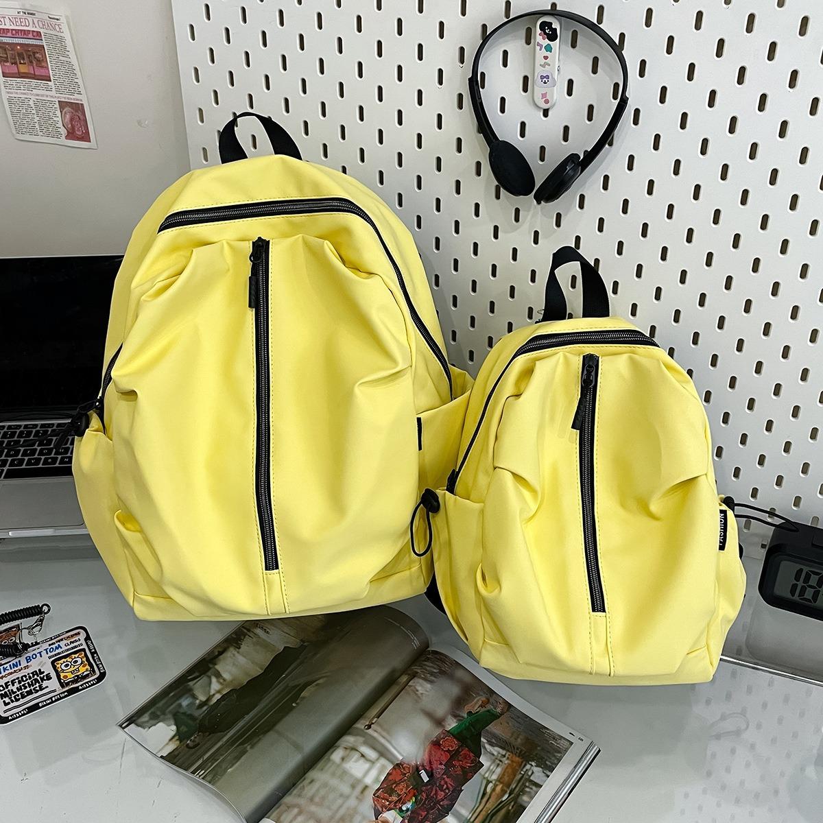 

Nylon casual backpack street trend Japanese backpack large capacity lightweight hiking bag Small жёлтый