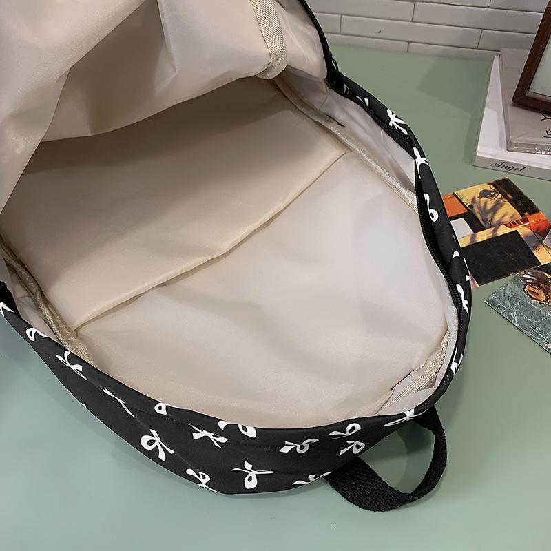 Schoolbag bow schoolbag junior high school girls ins style high value 1011 new college students Japanese travel backpack