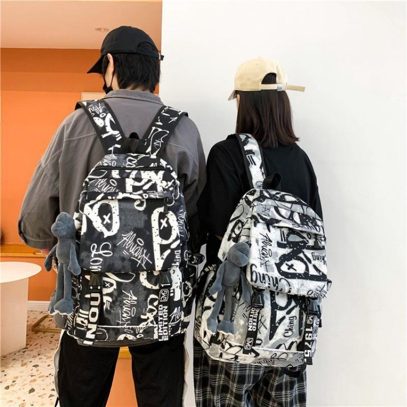 Mode Automne Cartable Personnalité Féminine Camouflage Graffiti Couple Sac à Dos Grande Capacité Sac à Dos Étudiant Masculin
