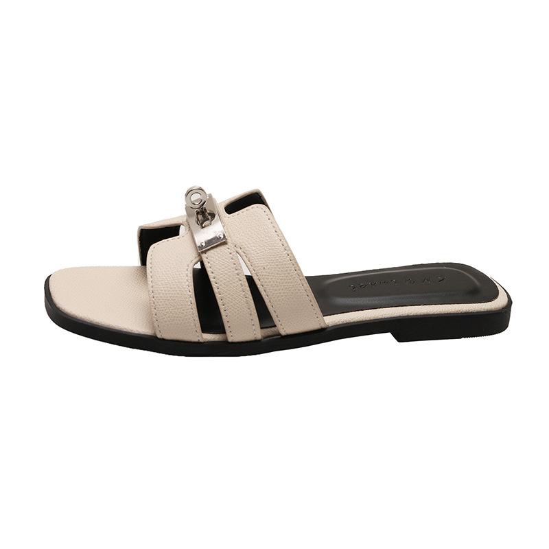 Korean high-end feeling~ slippers women's outer wear 2025 summer seaside beach shoes one-word flat-bottom lock cool slippers