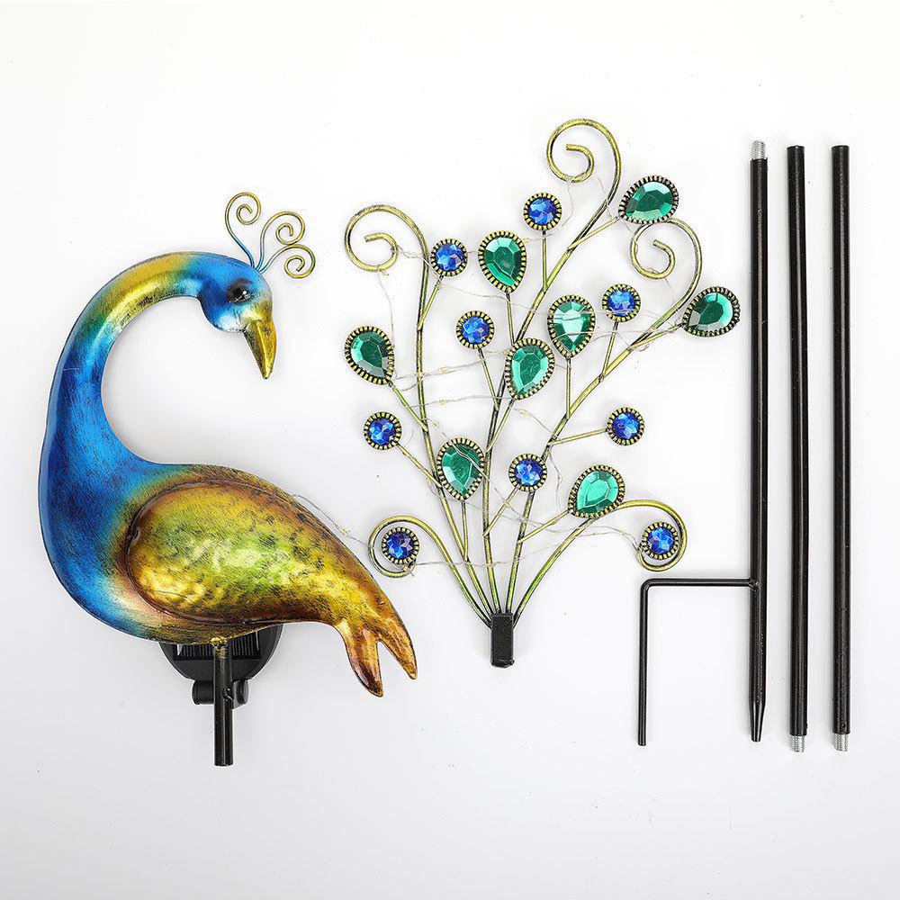 Solar Peacock Light: Waterproof Wrought Iron Garden Ornament for Lawn and Courtyard.