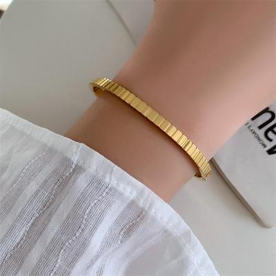 **Retro Striped Plaid Gold-Plated Titanium Steel Bracelet - European & American Autumn/Winter Style**