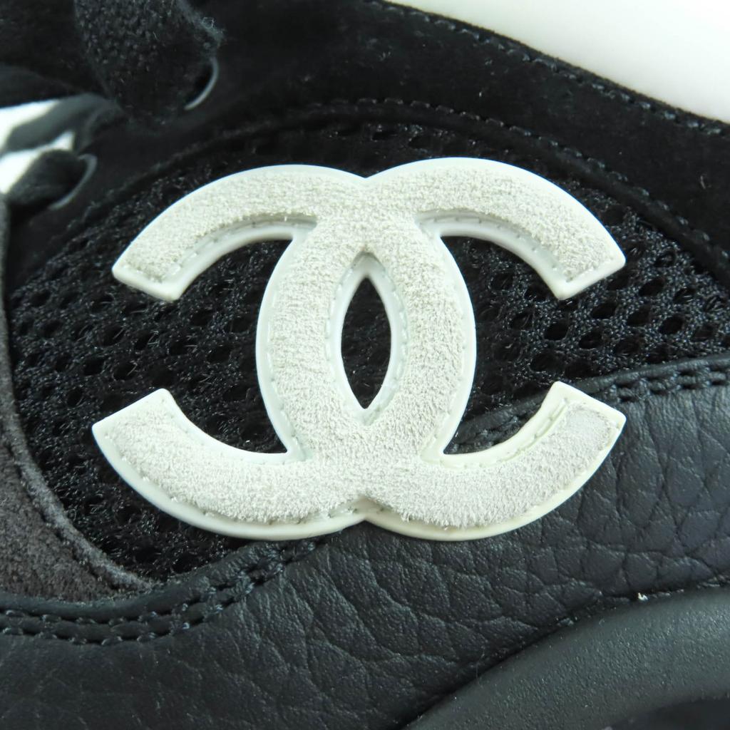 Ausgezeichnete CHANEL Sneaker Schwarz Weiß Leder Damen 37 G38299 Gebraucht