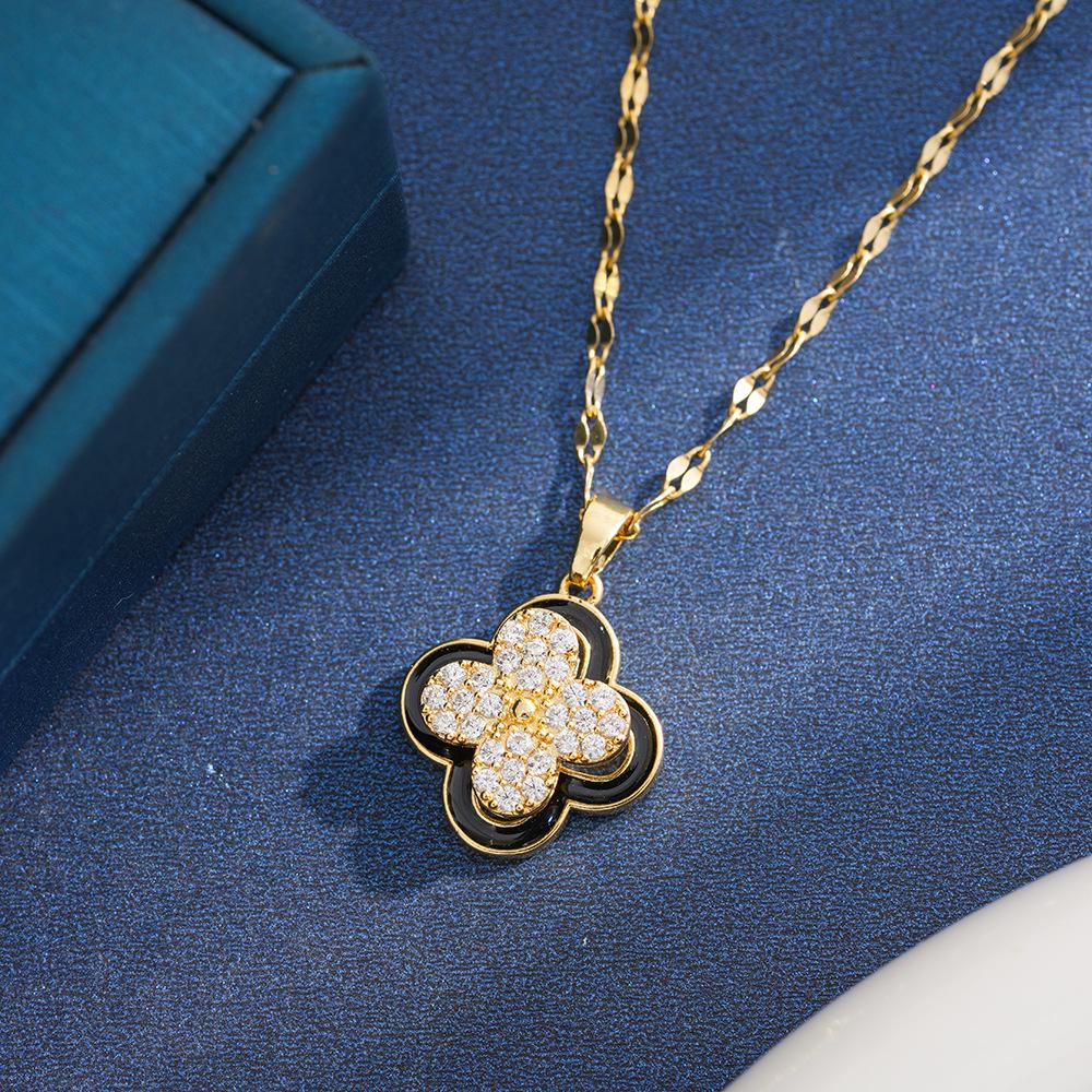 Women's Rotating Four-Leaf Clover Necklace with Colorful Zircon – Elegant Light Luxury Design