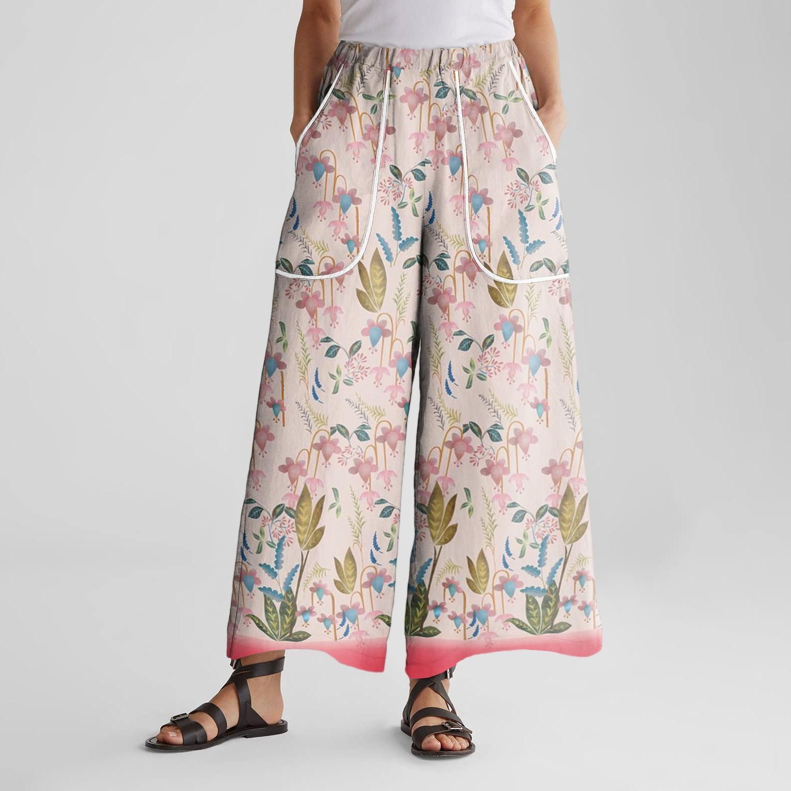 

Жіночі штани широкого крою з еластичним поясом, принтом, великими кишенями, оздобленням печворк, вільні штани L рожевий