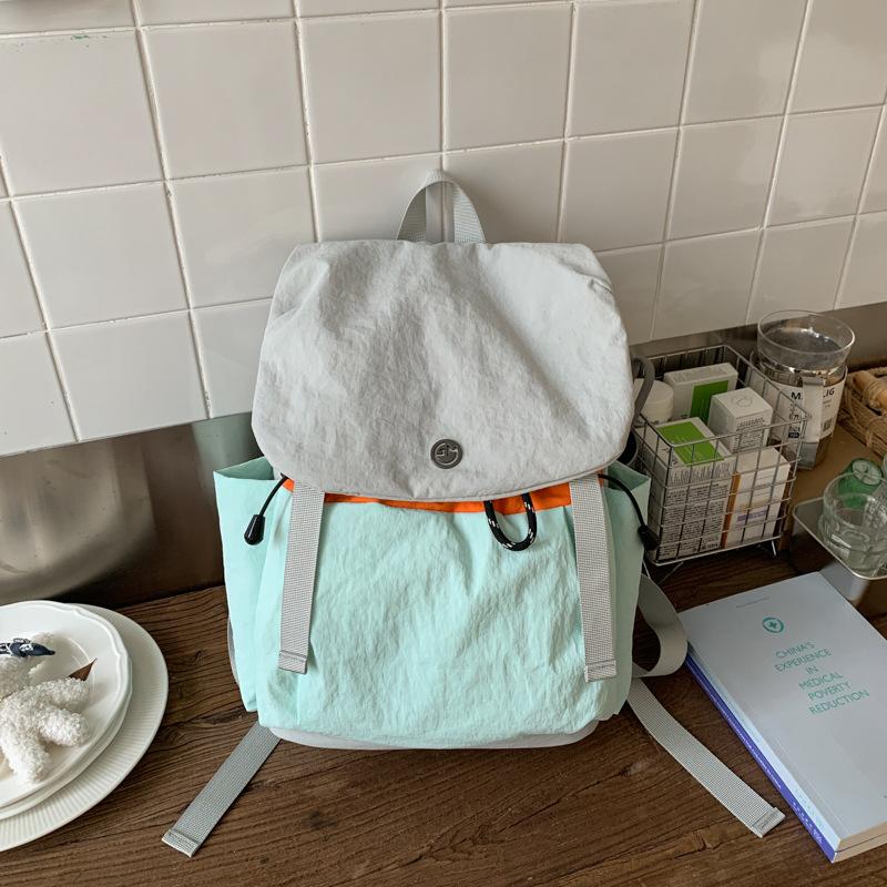 Niche design lightweight cloth bag women's new models, please first large-capacity travel backpack contrasting color backpack
