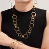 Qiong Yao Elegant Stainless Steel Interlocking Ring Jewelry Set: Large & Small Circle Earrings, Bracelet, and Necklace for Women.