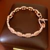 Rosenvergoldetes Zirkonia-Schweinchen-Verschlussarmband - Eleganter, vielseitiger, leichter Luxusschmuck.