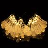 Solar LED Water Drop String Lights: Colorful, Moisture-Proof Decorative Lighting for Festivals, Hotels, and Courtyards with Ground Plug Feature.