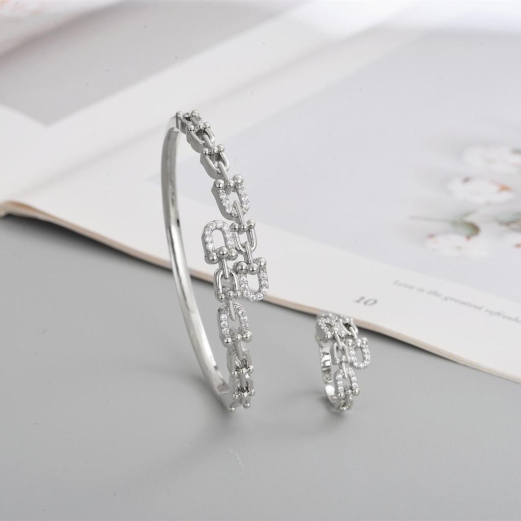 2026 Women's Gold-Plated Copper Full Diamond Pig Nose Bracelet and Ring Set