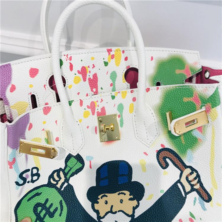 2021 New platinum bag first layer cowhide painted spray painting graffiti bag portable shoulder messenger bag personalized women's bag tide