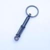 In-Stock Black Shock Absorber Keychain: Pressable Metal Spring Accessory - Perfect Small Gift