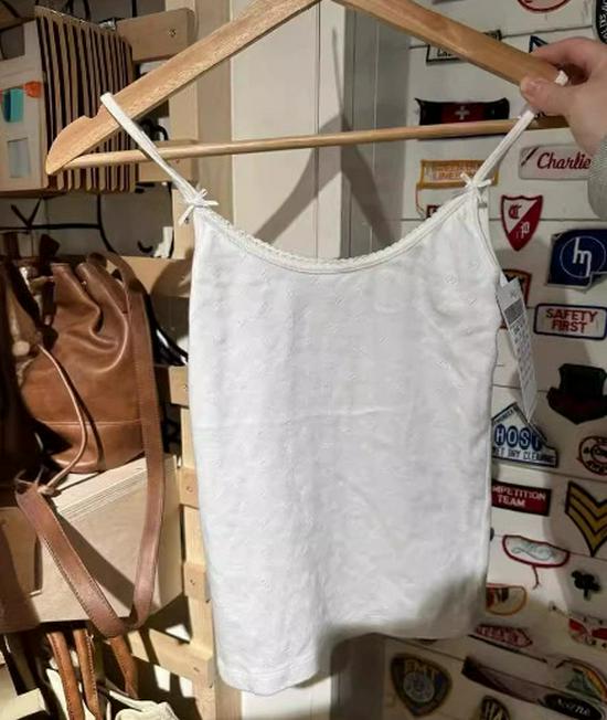 

Белый топ-камезоль в стиле BM с полумесяцем по краю и двойным бантиком с люверсами для девочек One Size