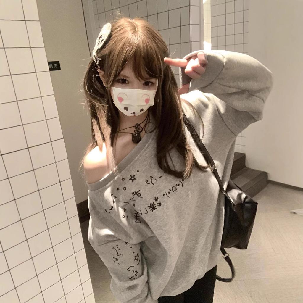 Sweat décontracté Design-siding pour femmes Au printemps et en automne Nouveau haut à épaules tombantes ample pour femmes