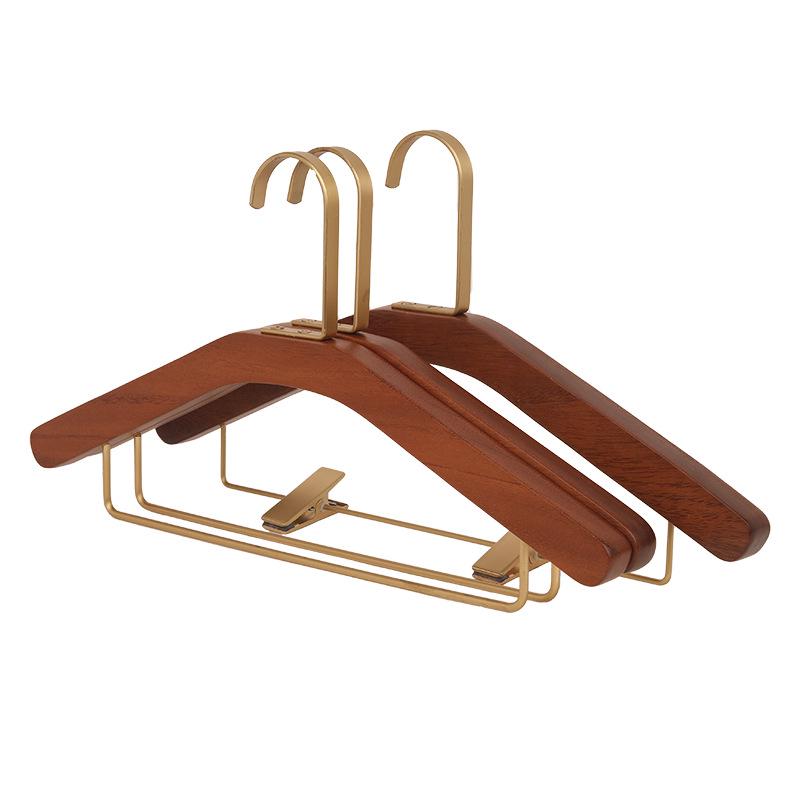 Kleiderbügel aus massivem Schwarznuss-Holz mit Kupferhaken, rutschfestes Design für Schlafzimmer und Hotelbekleidung