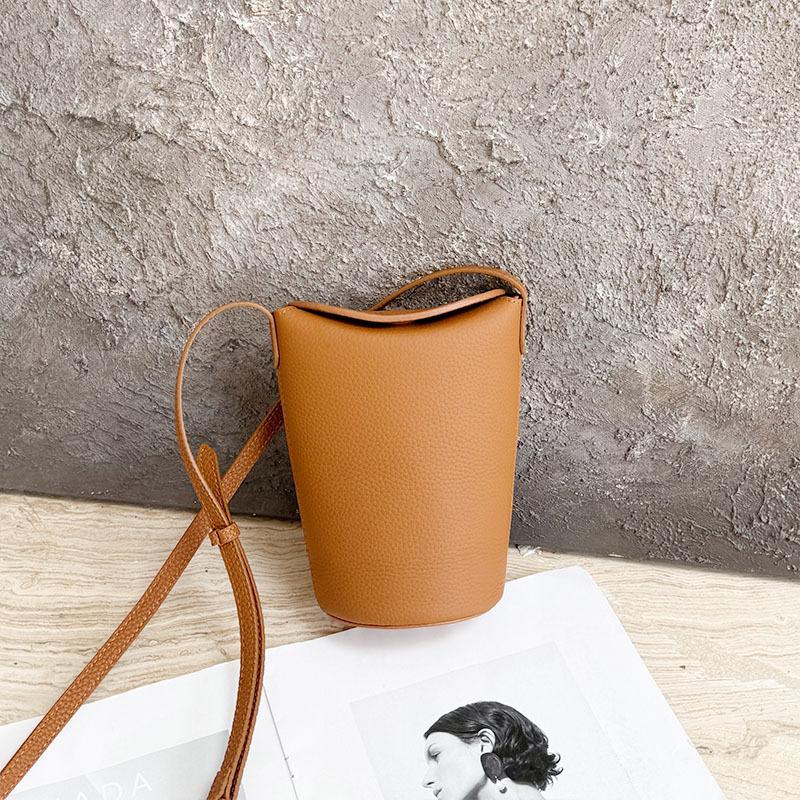 

Leather women s bag mobile phone bag new Korean version casual shoulder bag niche trend versatile bucket bag fashion small bag 10*8*18 золотисто-коричневый