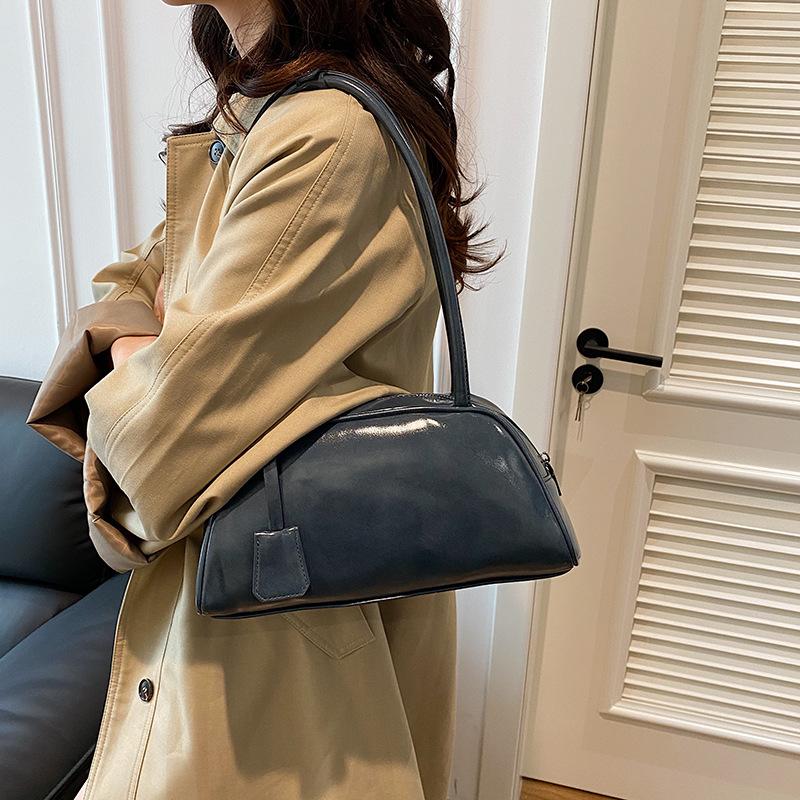 

Цього сезону осіння ніша нова сумка Бостон ручна сумка-багет під пахвами ретро універсальна повсякденна сумка через плече 28*11*14 синій