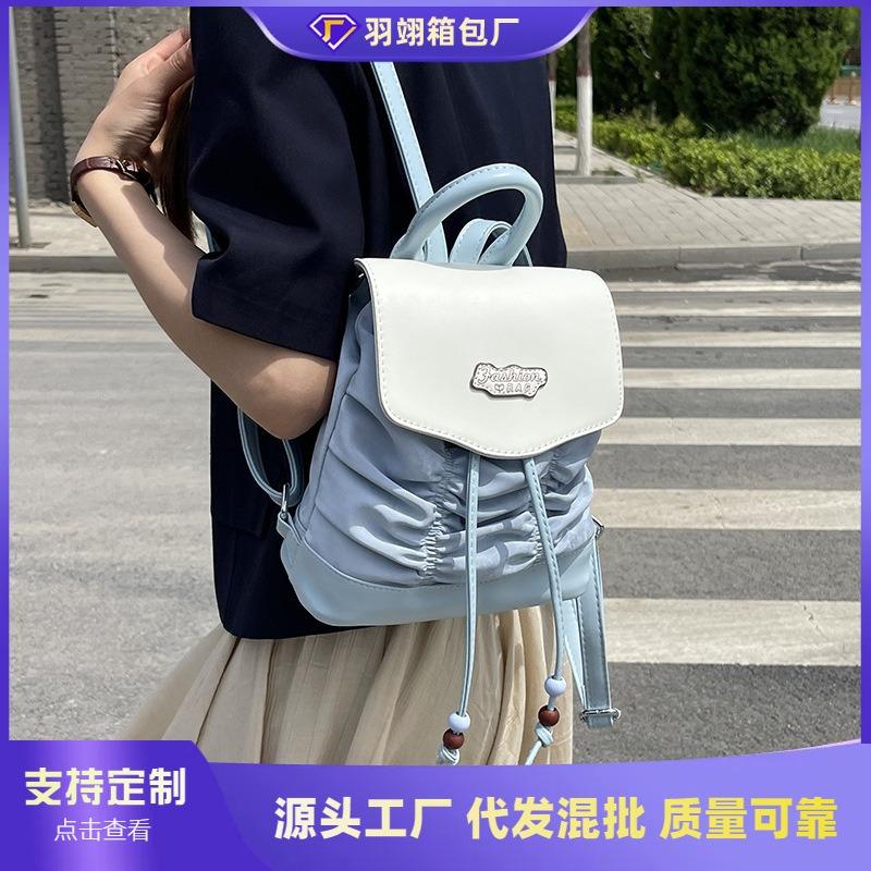 Niche design contrasting color backpack women's new pleated cute handbag versatile casual small backpack
