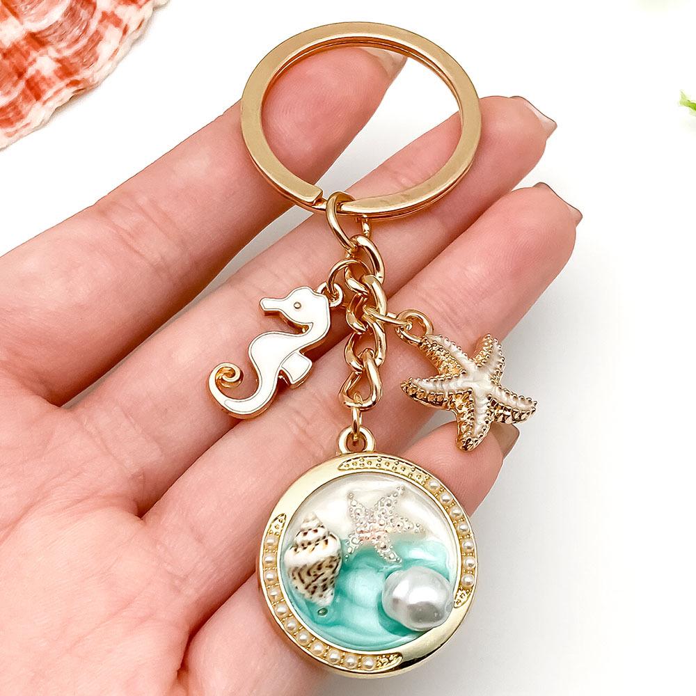 Ocean Drip Keychain: Green Starfish, Conch, Faux Pearl, Round Tag, Alloy Pendant