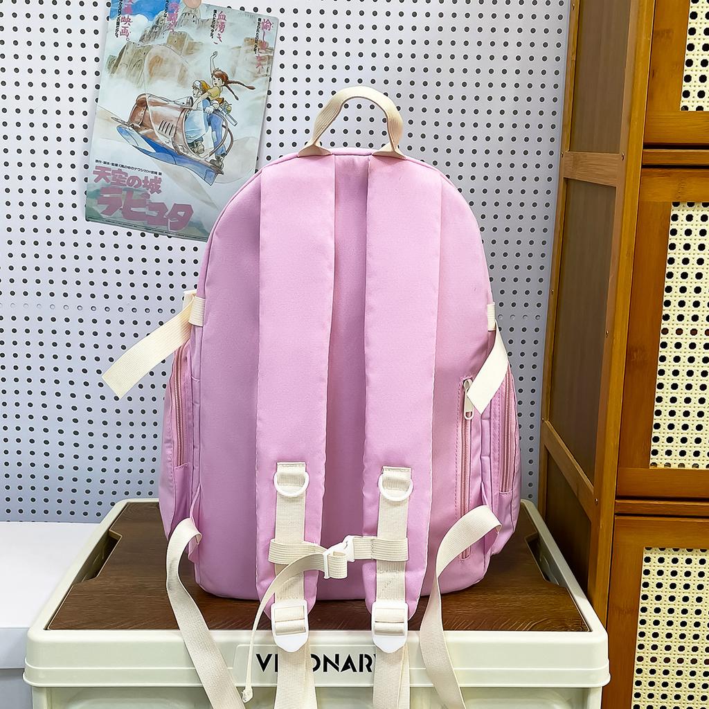 Korean version of large-capacity junior high school student schoolbag travel backpack high-value ins wind niche contrasting color backpack women