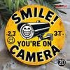 2D Flat Metal Sign Smile Youre On Camera Retro Tin Sign Yellow Round Metal Plate for Bar Home Wall Decor