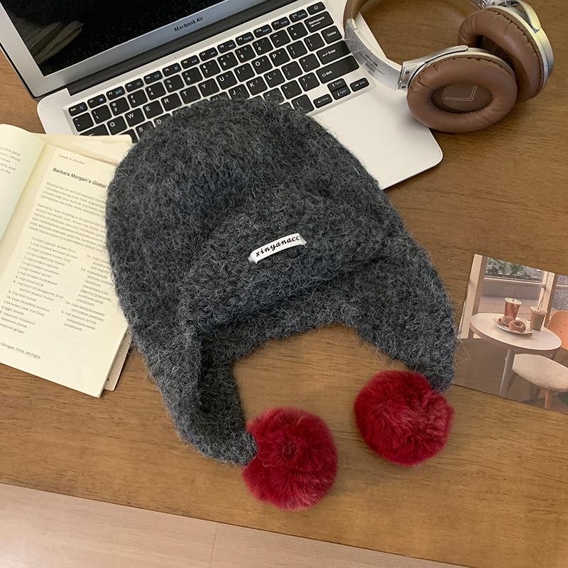 Cute green knitted hairball ear protection hat women's autumn and winter Korean flying hat wool hat warm Lei Feng hat tide