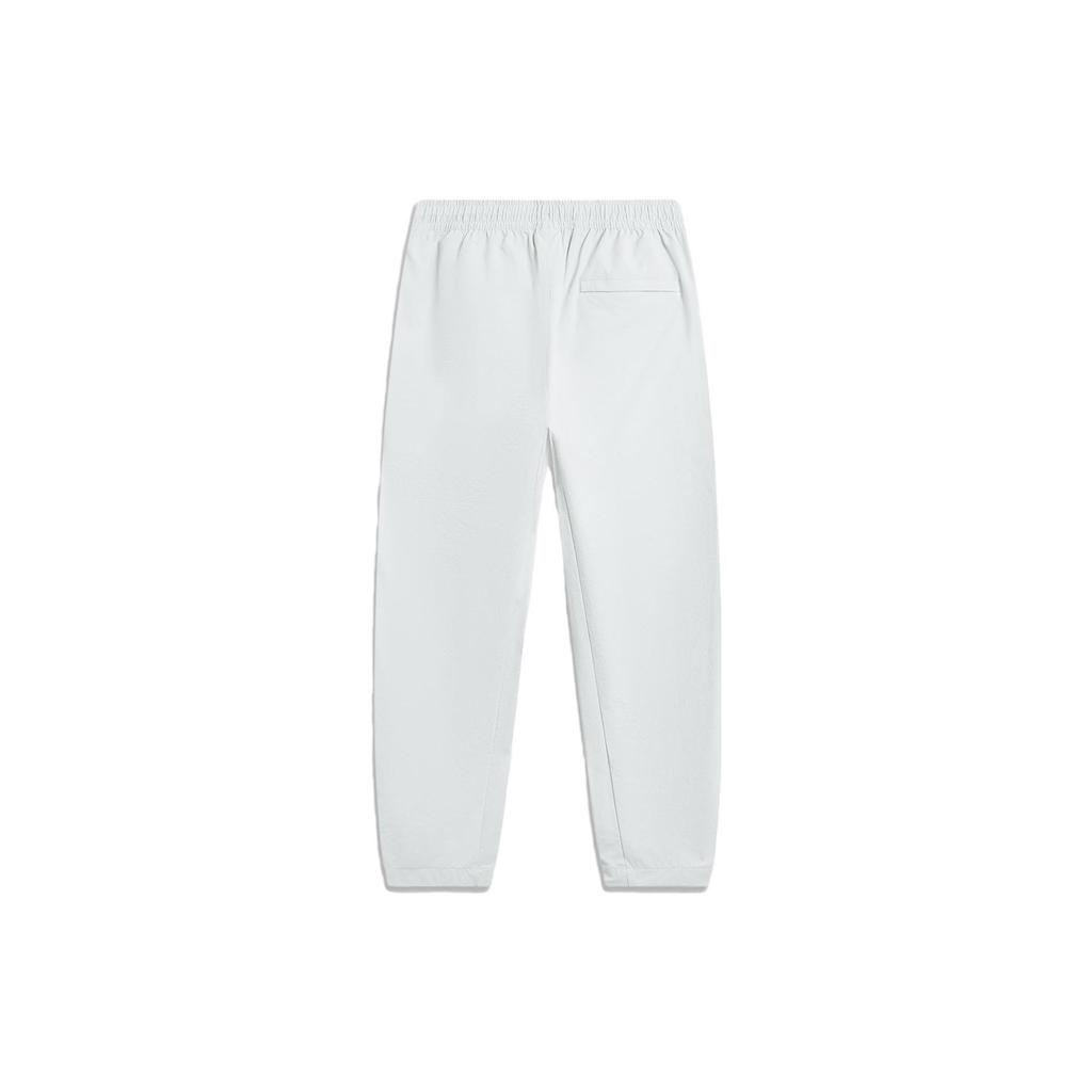 Li Ning X Cyril Artist Collaboration Wade Series Letter Solid Color Printed Drawstring Cuffed Sports Pants Men bottoms Stone-Gray AYKT761-3