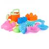 Children's beach and sandbox toy set, including a large round sandcastle bucket, sandcastle mold, and a large shovel. The colors