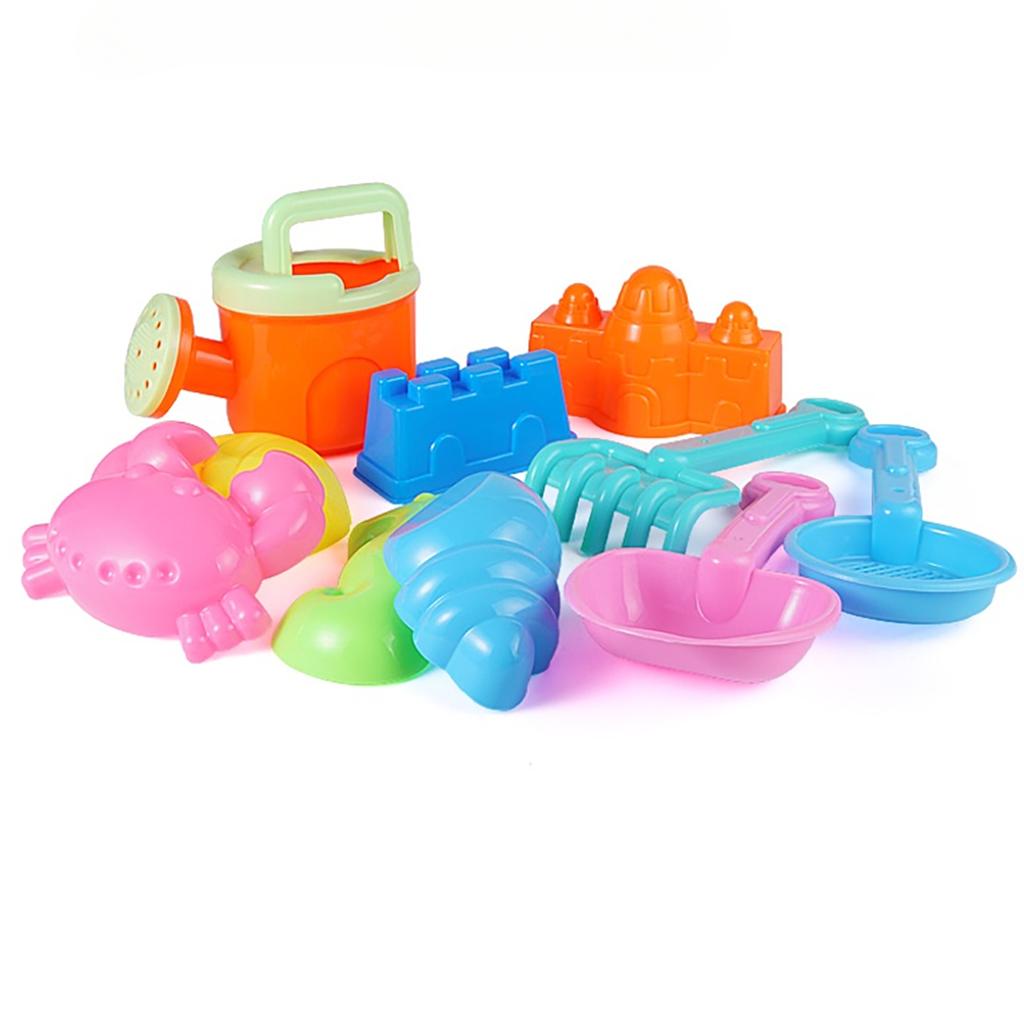 Children's beach and sandbox toy set, including a large round sandcastle bucket, sandcastle mold, and a large shovel. The colors