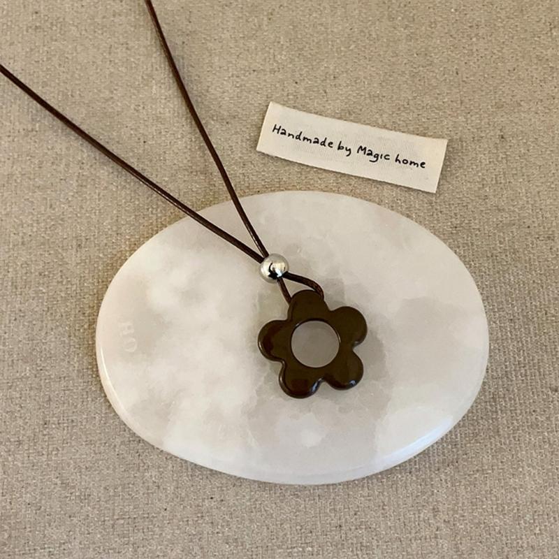 Delicate Long Leather Cord Necklace with Intricate Flower Charm Ideal for Fashion Forward Women Seeking Unique Accessories