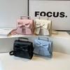 Backpack women's new texture niche design portable bow schoolbag lightweight travel backpack