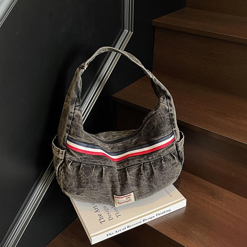 

Fashion trend casual simple large capacity armpit bag versatile commuter canvas lightweight portable shoulder women s bag чорний