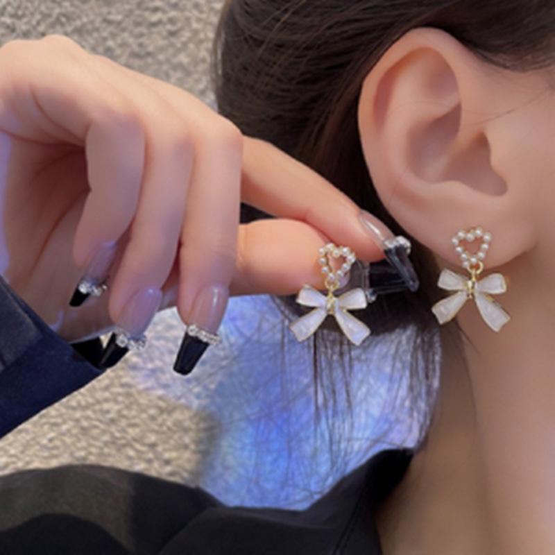 Korean Unique Pearl Bow Earrings for Women 2024 - Stylish, Versatile, and Elegant Stud Jewelry