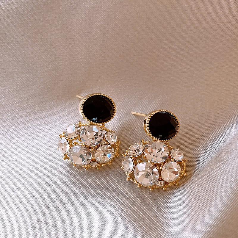 

Овальные серьги с имитацией циркония