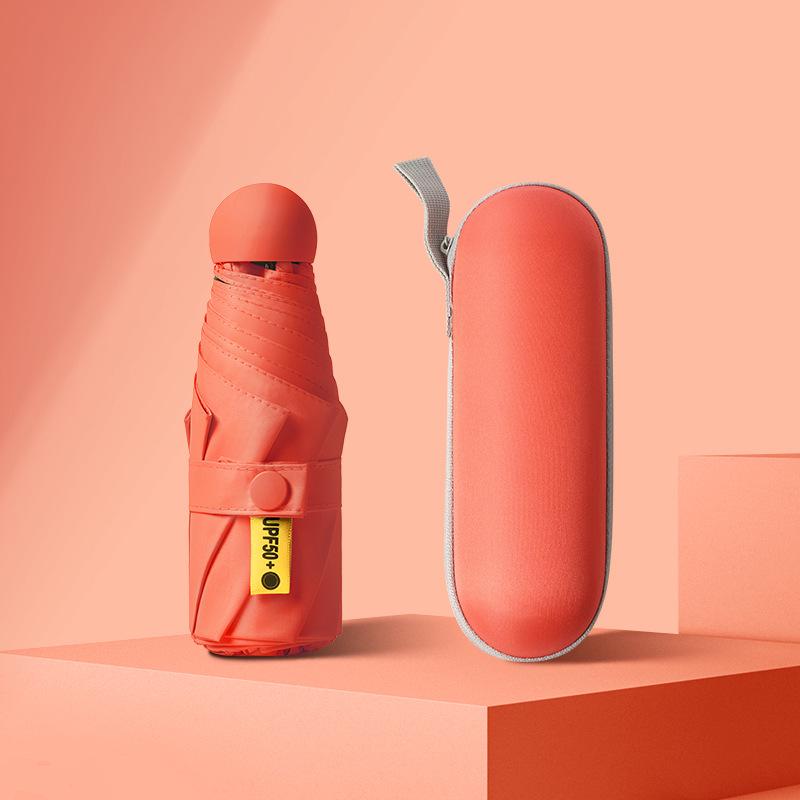 50 % rabatt på svart kapselparaply i lommeformat - Seks-skjerms sammenleggbar for sol og regn