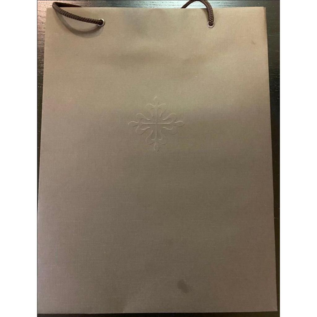 Used Unopened Patek Philippe Collection Book 2024-2025 with paper bag, wristwatch