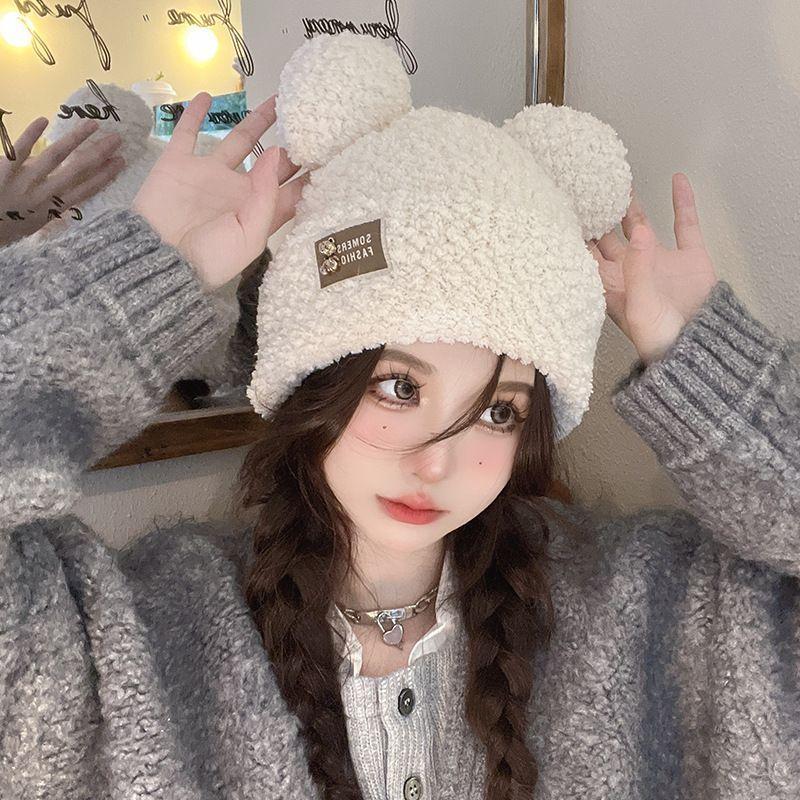 Autumn and winter thickened soft waxy warm cold ear protection cold hat Korean version of metal cute bear plush knitted versatile model