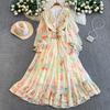 French niche gentle wind temperament V-neck dress women's autumn and winter design waist thin big swing ruffle edge dress