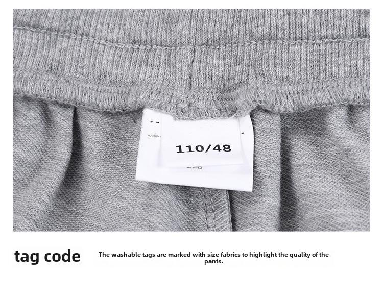 Tmavě modré školní sportovní kalhoty z čisté bavlny pro žáky prvního stupně - chlapci a dívky, volný střih, letní kalhoty.