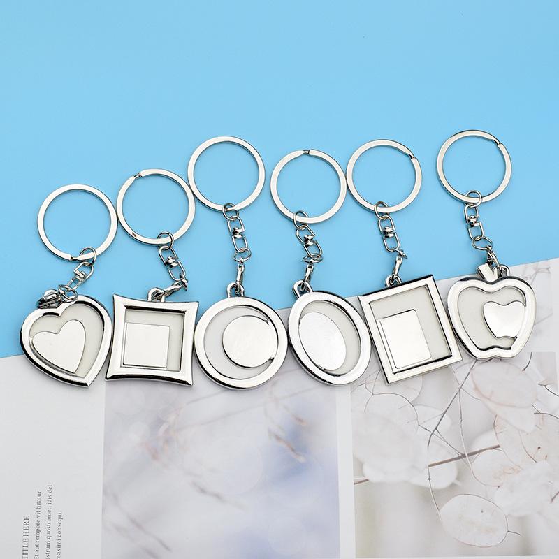 Hjärtformad metallfoto-nyckelring: Perfekt examenspresent