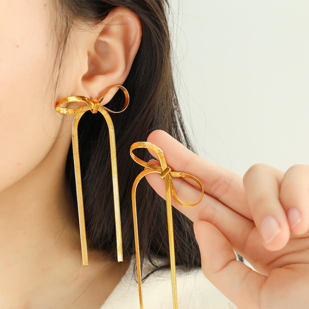 Long tassel bow earrings titanium steel gold-plated chain bow pendant earrings niche design