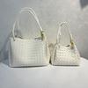 2025 New leather women's bag fashion classic woven bag butterfly buckle parachute shoulder oblique span bag