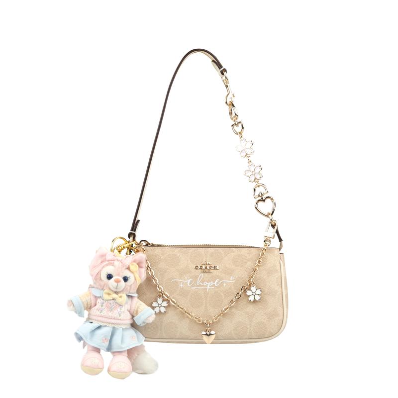 

COACH handbag [Customized bag] Nolita 19 RC Xiong Xiongzai classic presbyopic print zipper coated canvas shoulder small size women s rice brown Alikui білий