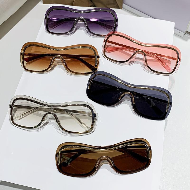 New outdoor cycling sports sunglasses, frameless, stylish, and cool, with a single-piece design and metallic trim, women's sunglasses