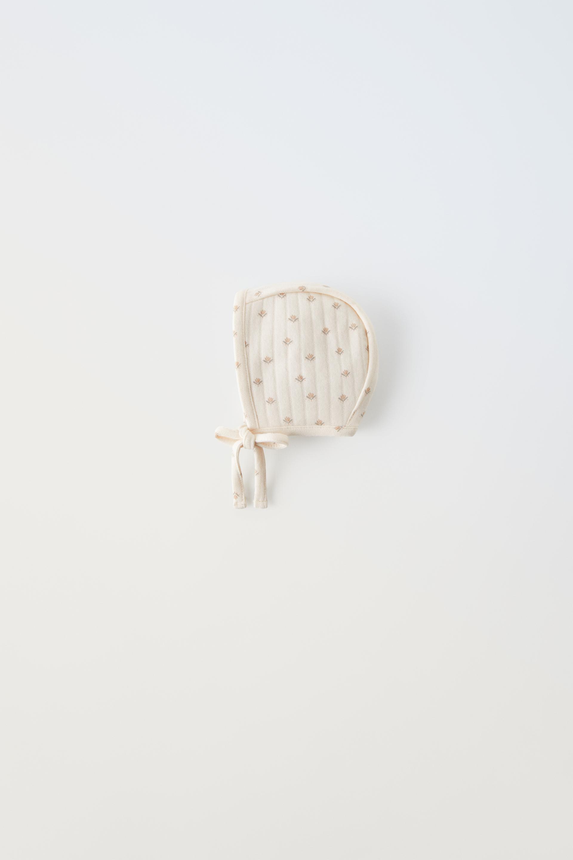 

СТЕГАНЫЙ КАПОН С ЦВЕТОЧНЫМ ЦВЕТОМ