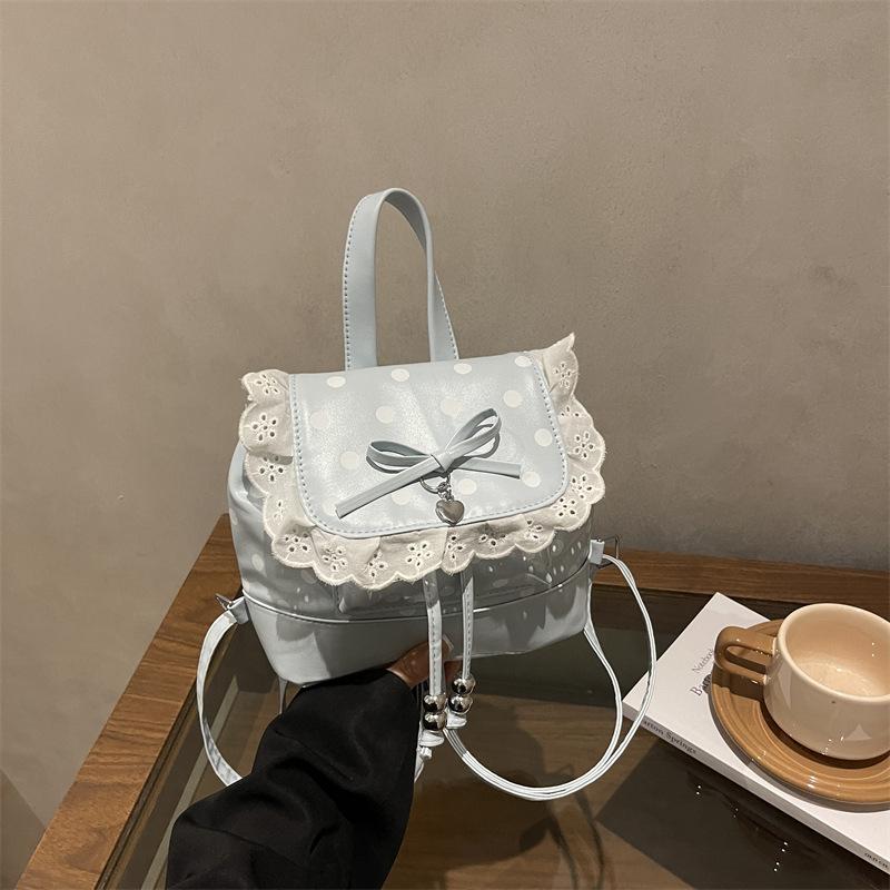 Schoolbag Korean cute college style backpack 1011 spring new commuter small backpack portable niche polka dot handbag