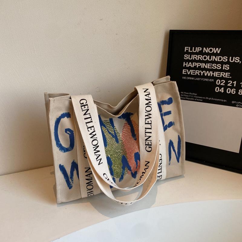 Commuter large-capacity alphabet canvas bag women's new fashion college student shoulder tote bag portable leisure bag