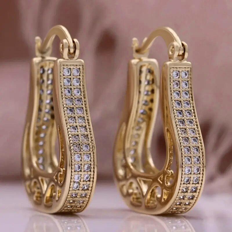 

European and American Trendy Alien Metal Hollow Ear Buckle Women s U-shaped High End Style Attending Banquet Zircon