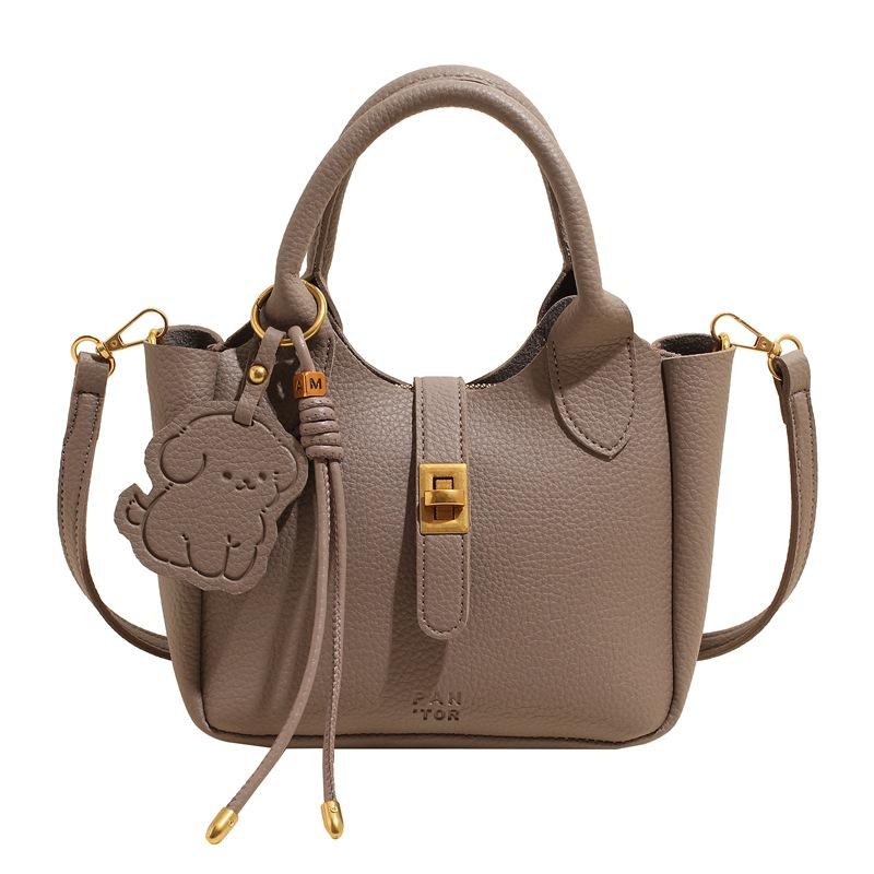 

New niche light luxury high-end lychee pattern portable bucket bag temperament versatile commuter messenger bag woman