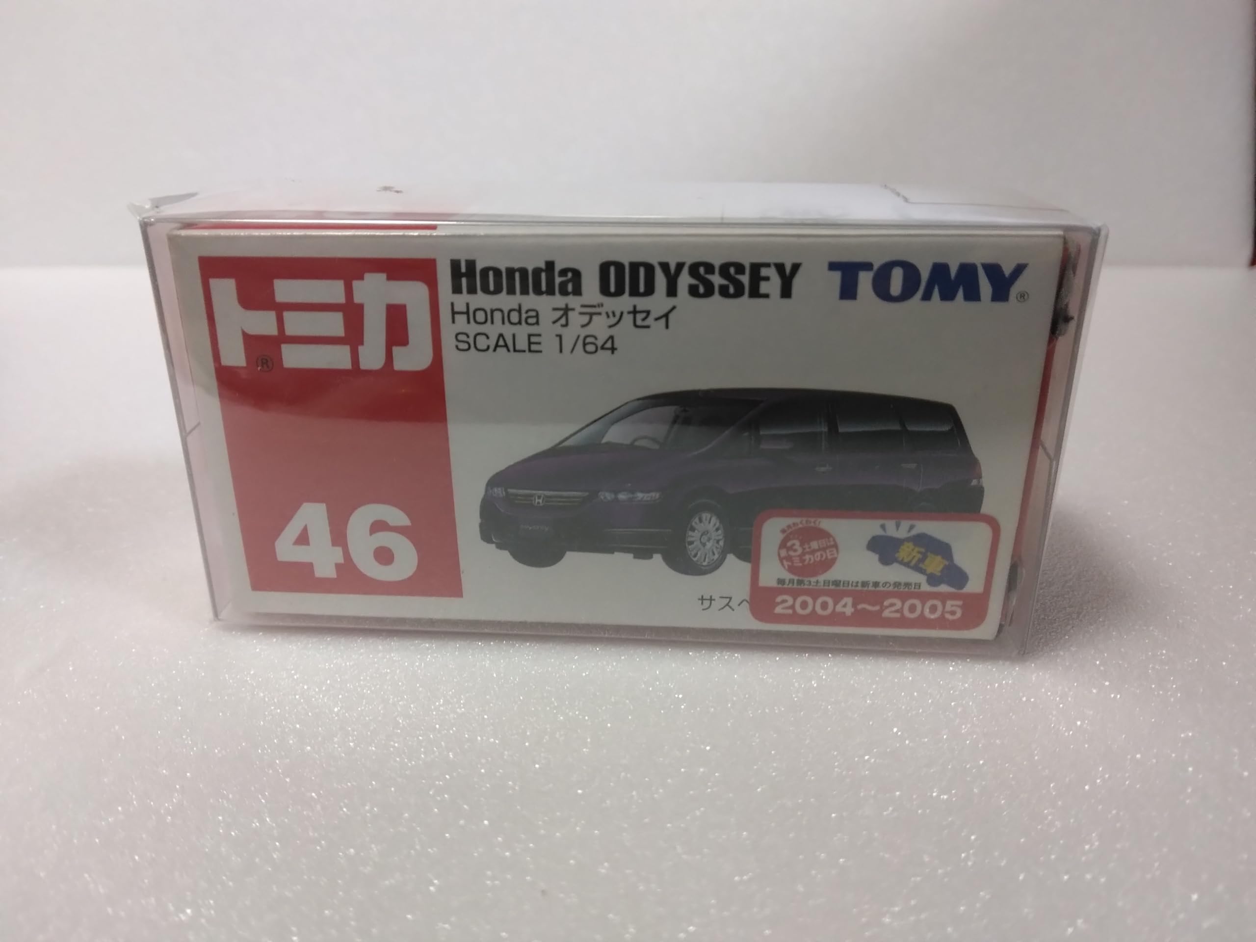 

Tomica 1/64 scale Honda Odyssey diecast model car, purple, 2004-2005.